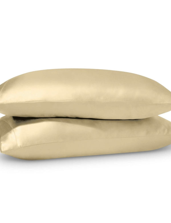 2 satin pillowcases on pillows stacked