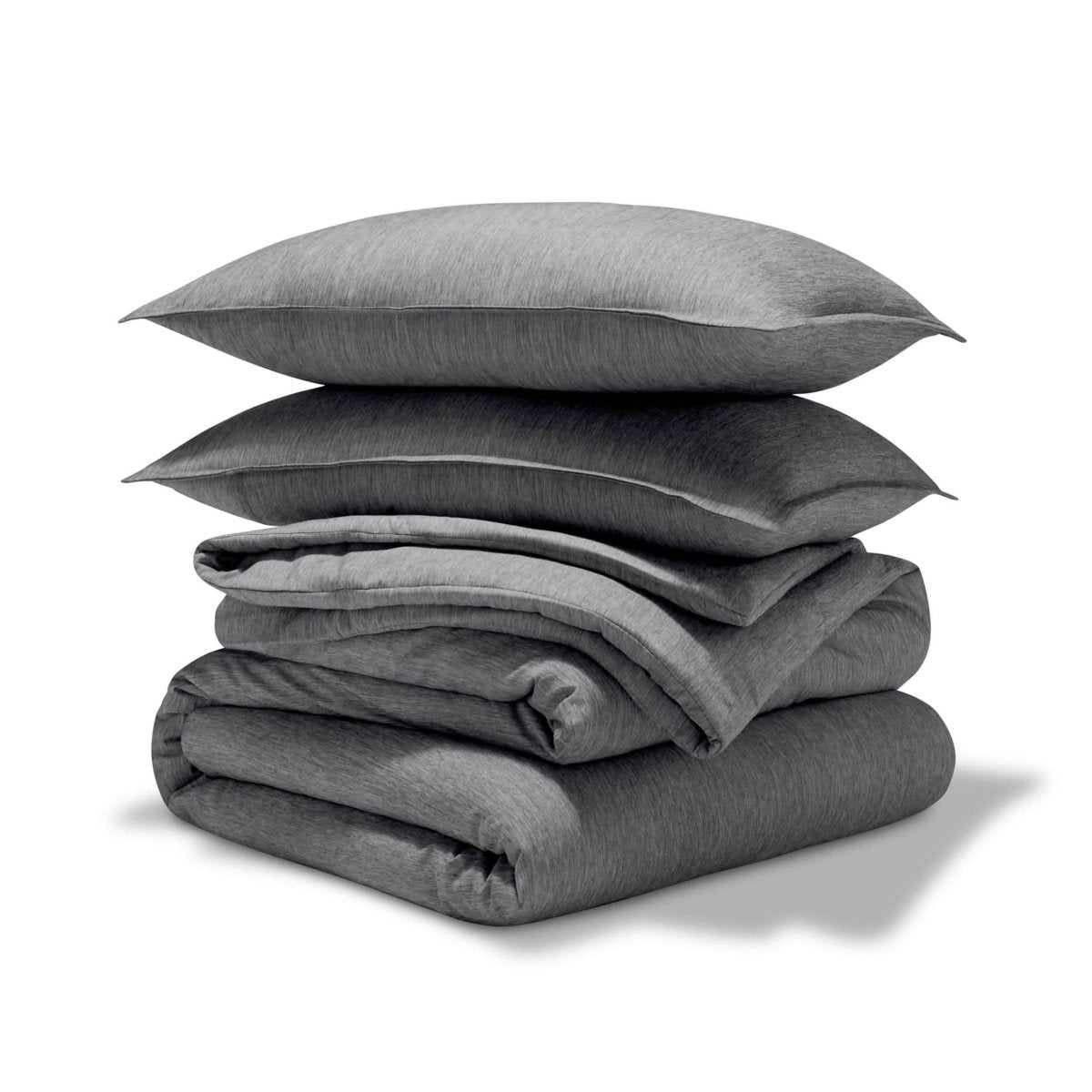 A comforter set folded and stacked
