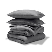 A comforter set folded and stacked