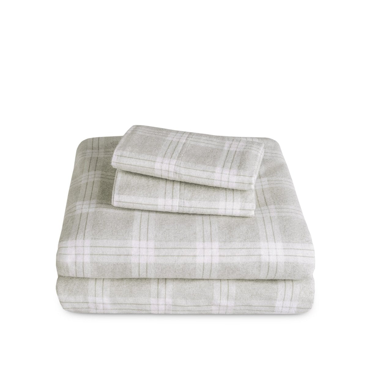 Stack of flannel sheets and pillowcases on a white background