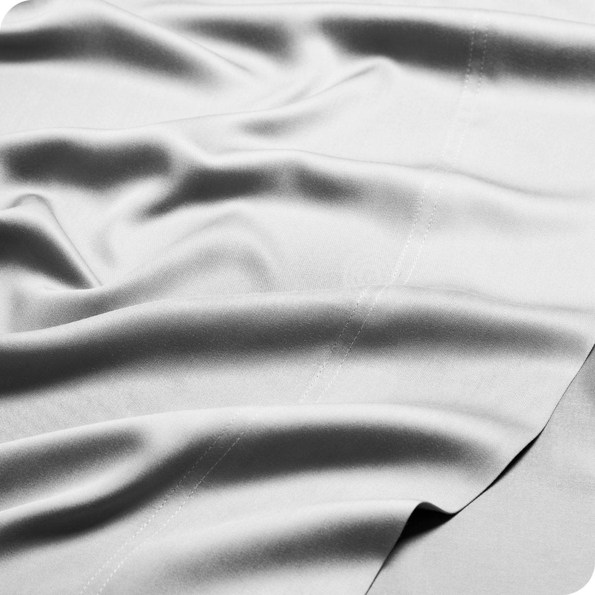 Detailed view of a bamboo sheet, highlighting its smooth surface and elegant design.