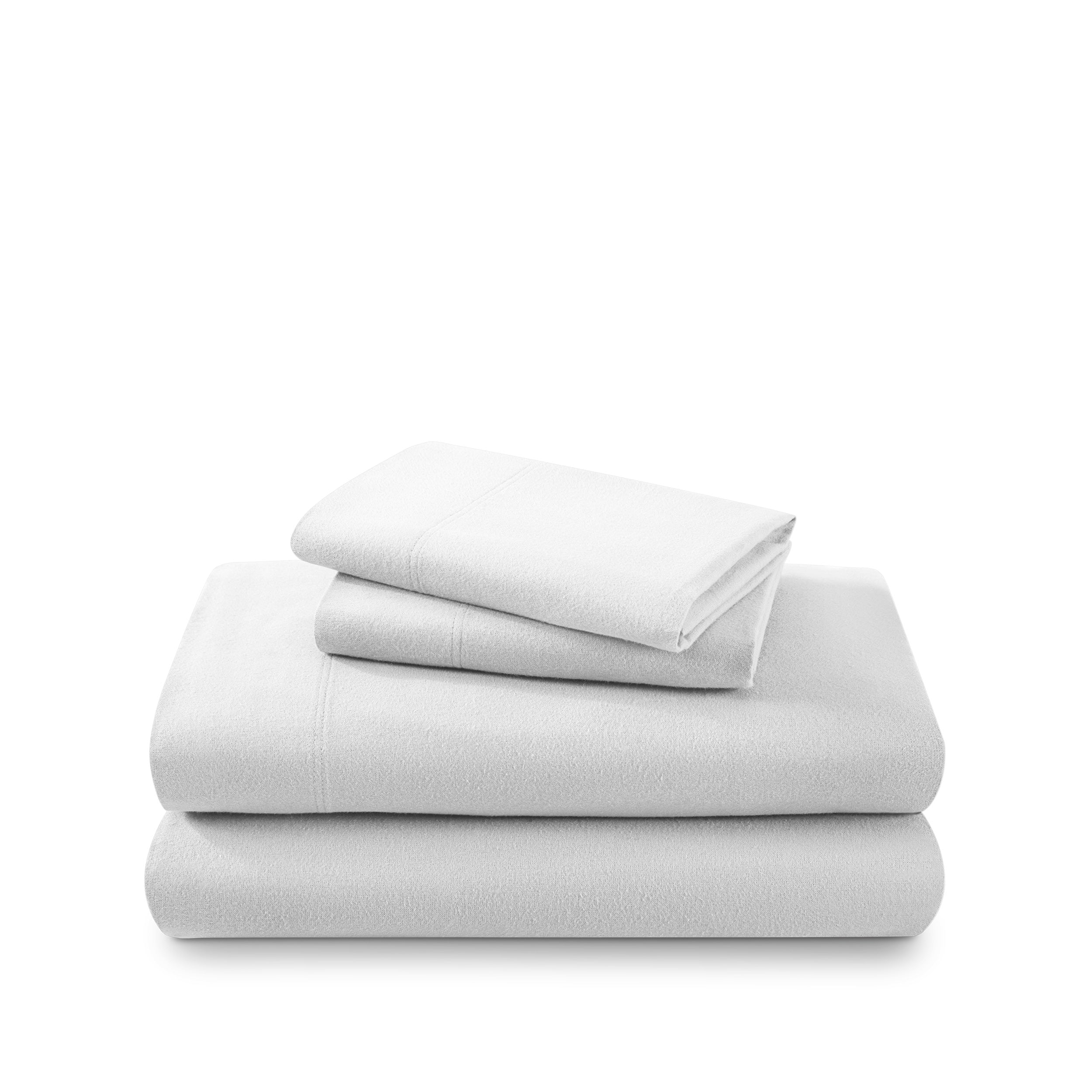 Cotton flannel sheet set folded and stacked on a white background