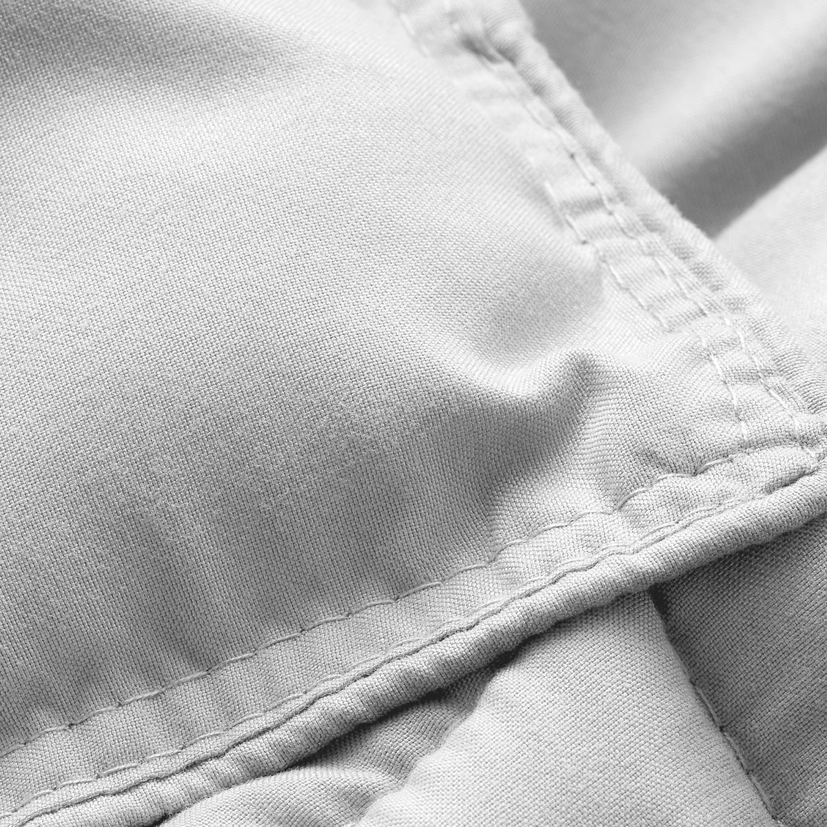 Close-up of comforter fabric with stitching detail