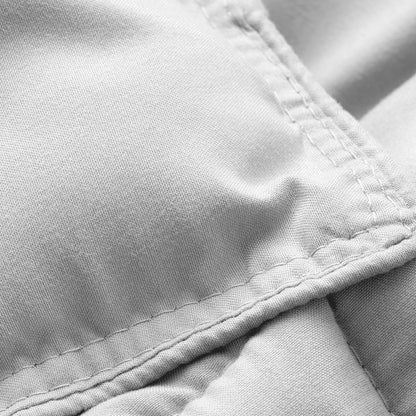 Close-up of comforter fabric with stitching detail