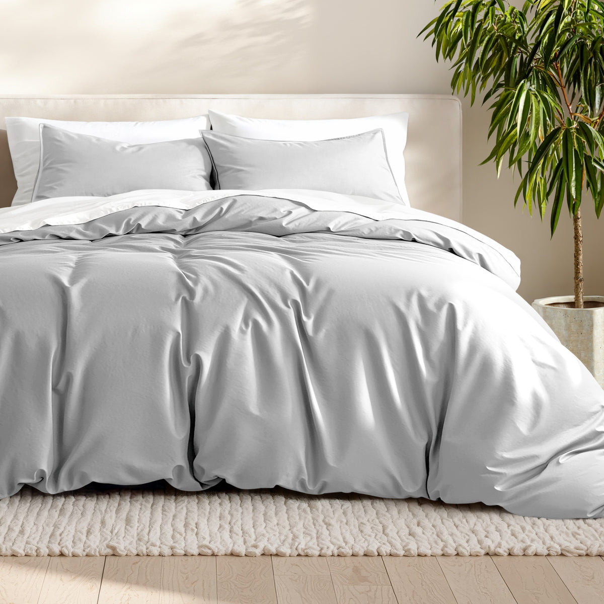 Microfiber bedding set on a bed with a neutral background