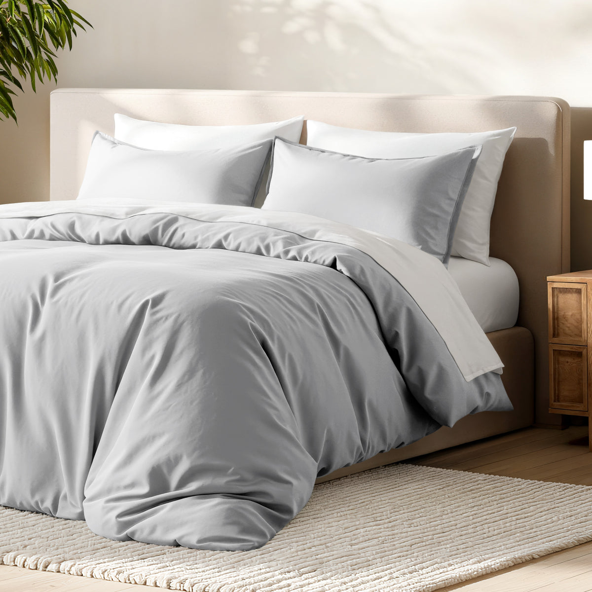 Bed with microfiber duvet cover and sham set in a bedroom setting.