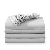 4 ultra soft fitted sheets folded and stacked
