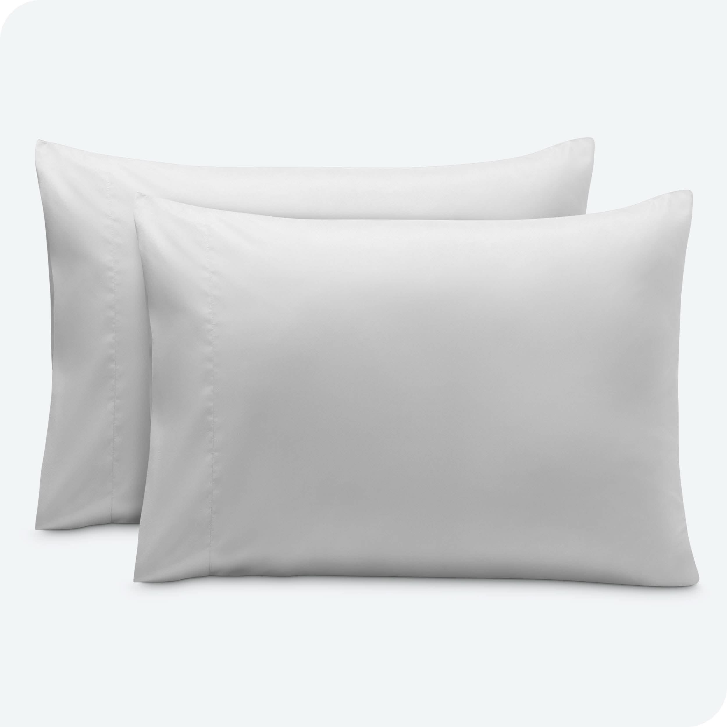 2 pillowcases on pillows