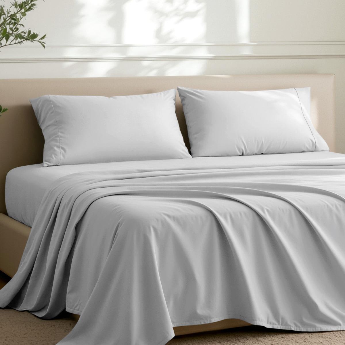 2 pillowcases on pillows on a nicely made bed