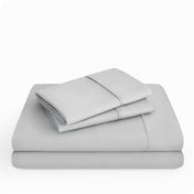 Microfiber sheet set folded and stacked neatly.