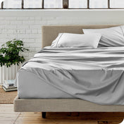 A modern bedroom with microfiber sheets on the mattress
