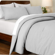 An angled view of a comforter set on a bed