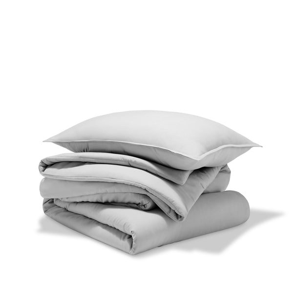 A comforter set folded and stacked