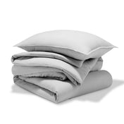 A comforter set folded and stacked
