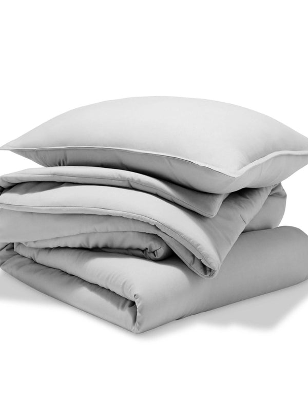 A comforter set folded and stacked