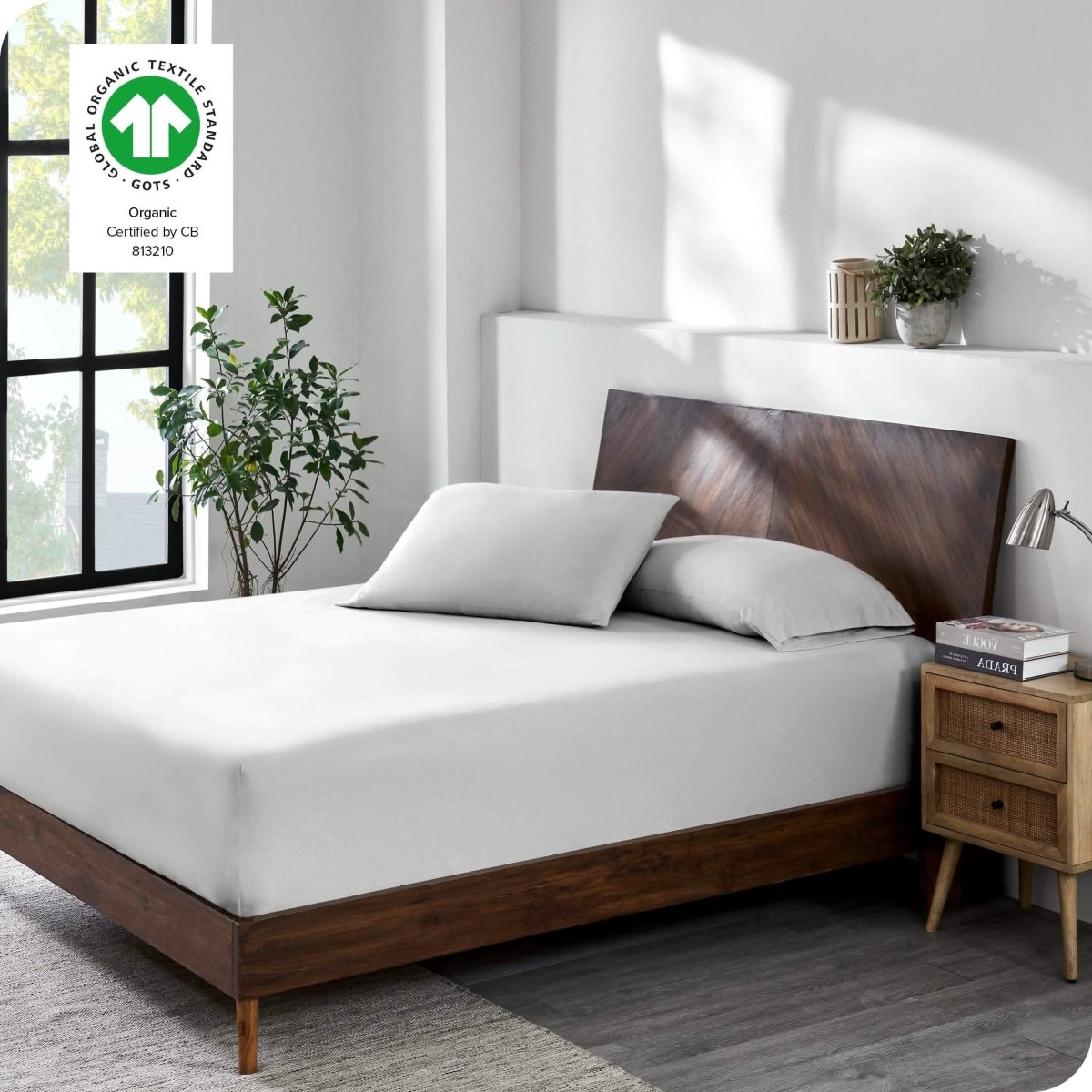 A modern bedroom with a jersey fitted sheet on the mattress with matching pillowcases