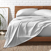 A bed made with organic jersey sheets