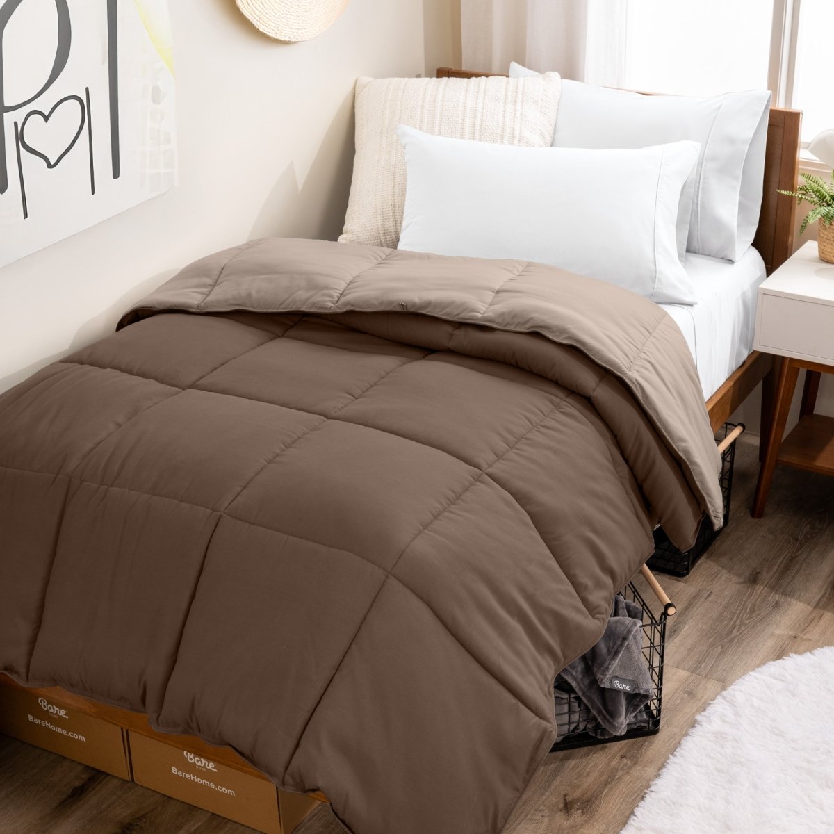 College dorm room with a reversible comforter on the bed