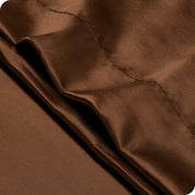 Close up of the closure on a silk pillowcase