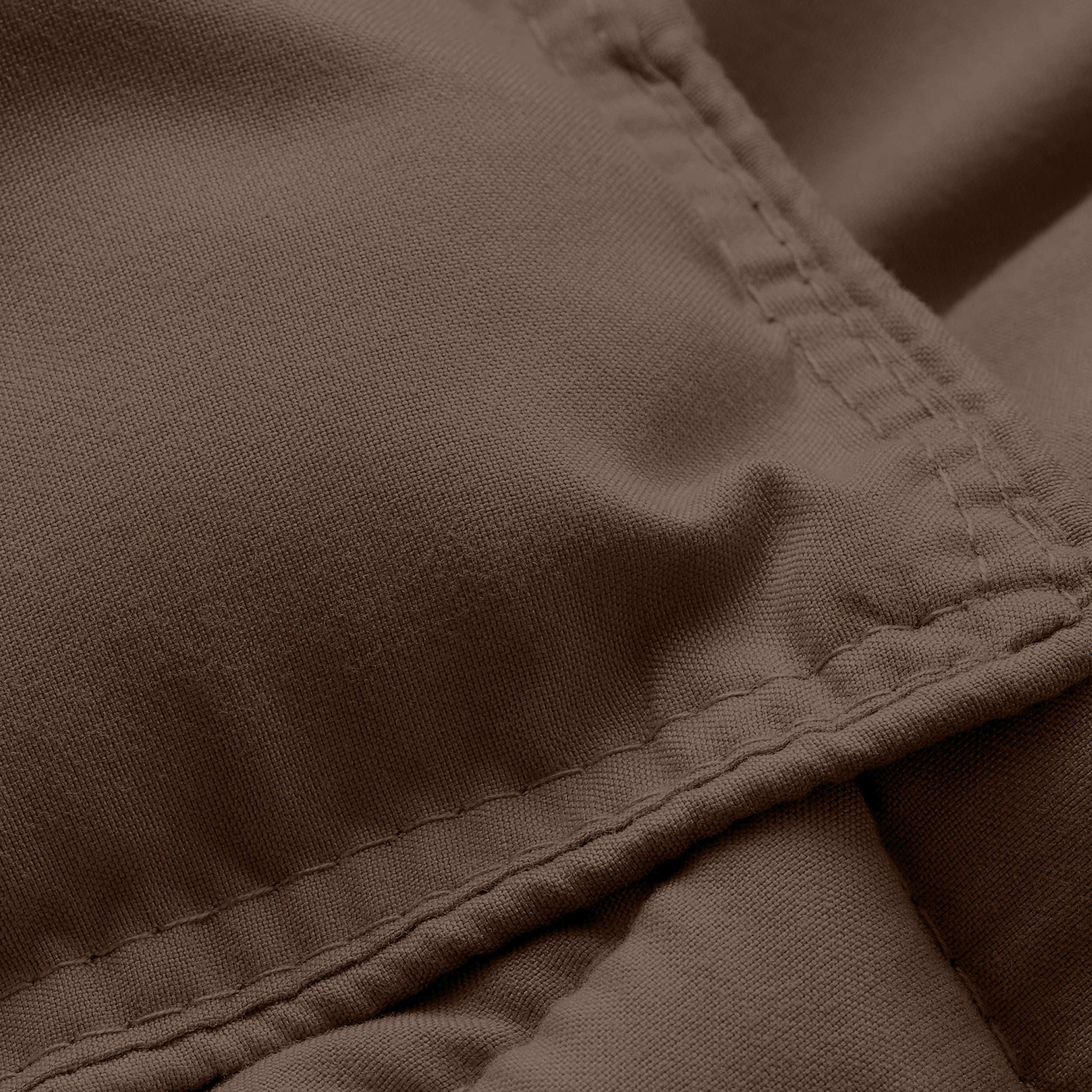 Close-up of comforter fabric with stitching detail