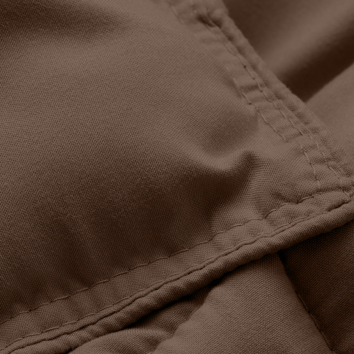 Close-up of comforter fabric with stitching detail