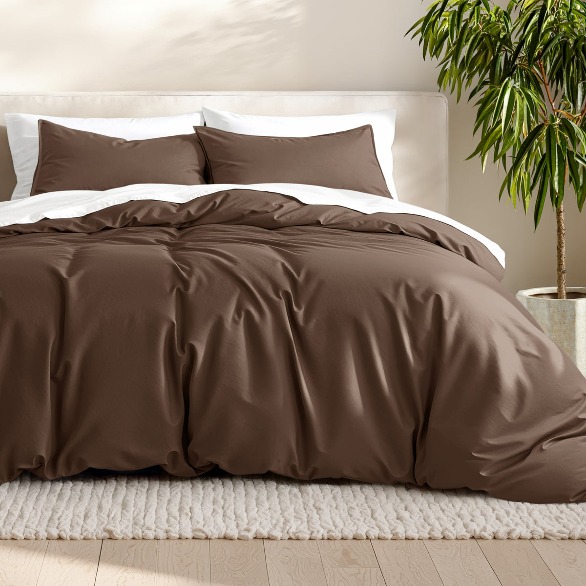 Microfiber bedding set on a bed with a neutral background