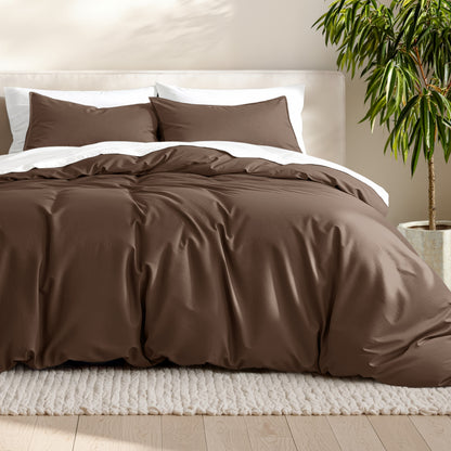 Microfiber bedding set on a bed with a neutral background