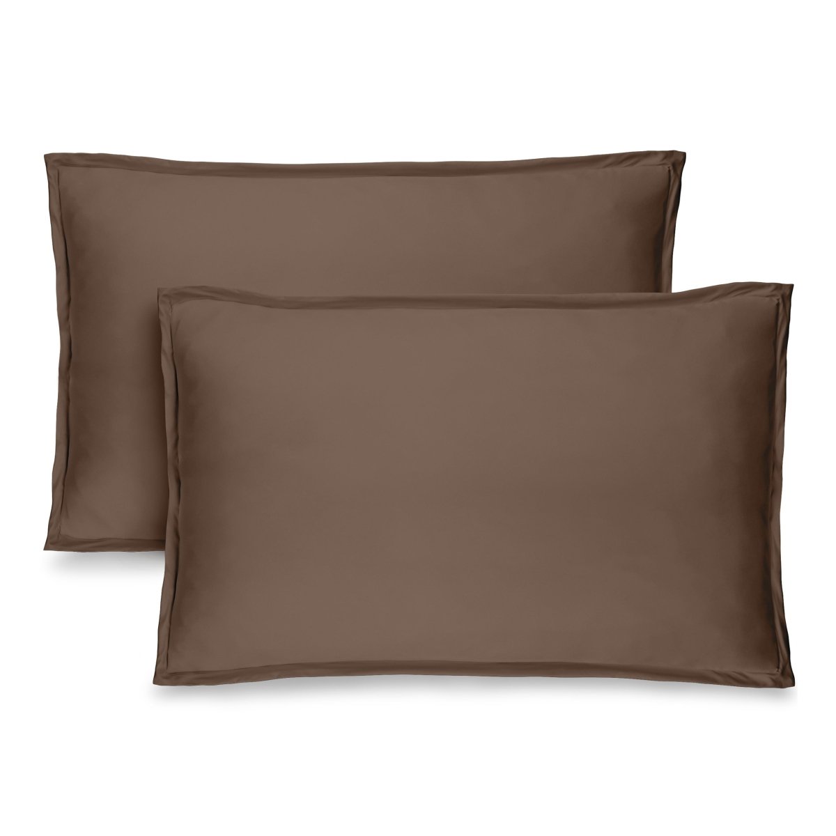 Two brown pillow shams on pillows standing up with one behind the other