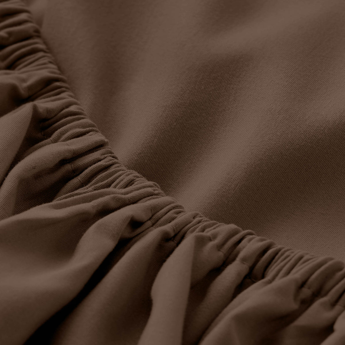 Close-up of fitted sheet with all around elastic