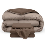 A reversible microfiber comforter and a coordinating sheet set folded and stacked