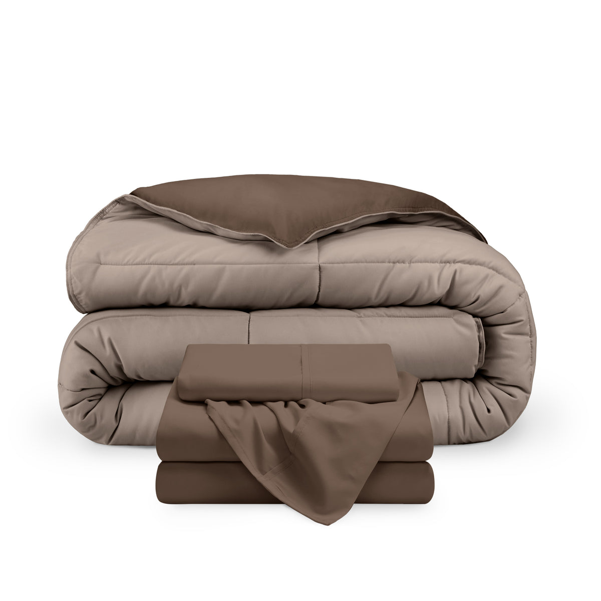 A reversible microfiber comforter and a coordinating sheet set folded and stacked