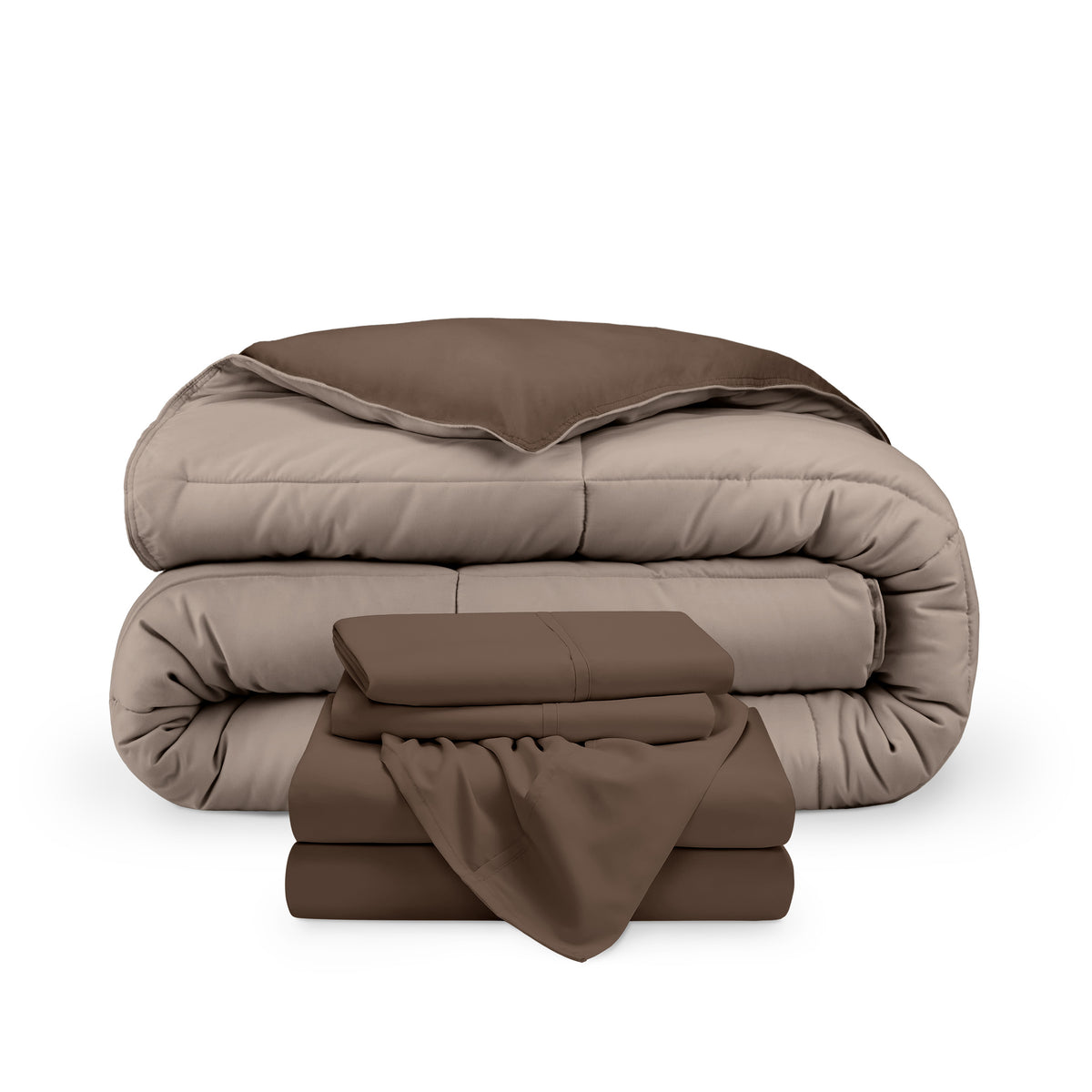A reversible microfiber comforter and a coordinating sheet set folded and stacked