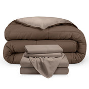 A reversible microfiber comforter and a coordinating sheet set folded and stacked