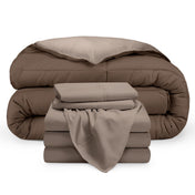 A reversible microfiber comforter and a coordinating sheet set folded and stacked