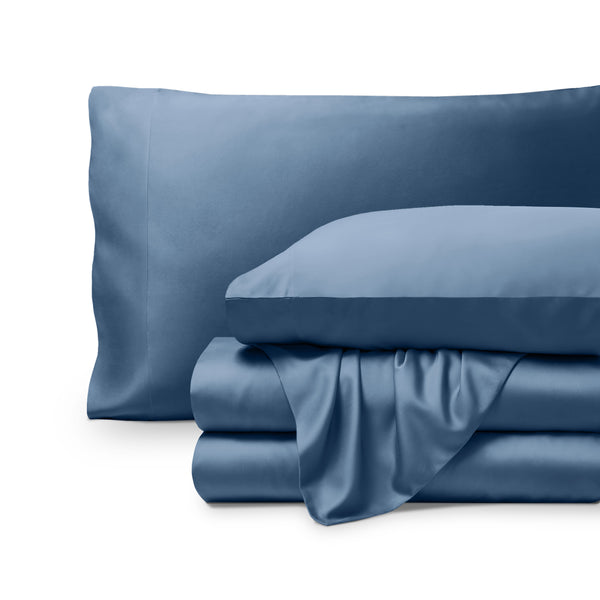 Bamboo pillowcases and sheets set on a white background