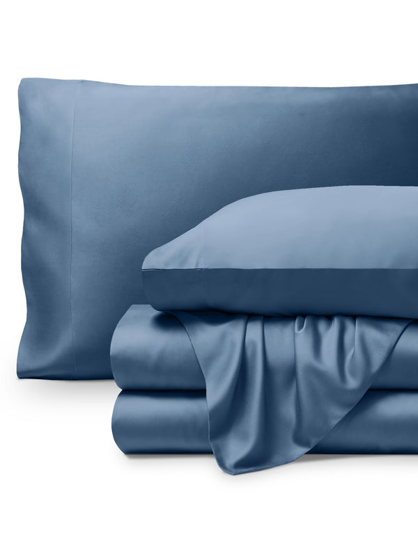 Bamboo pillowcases and sheets set on a white background