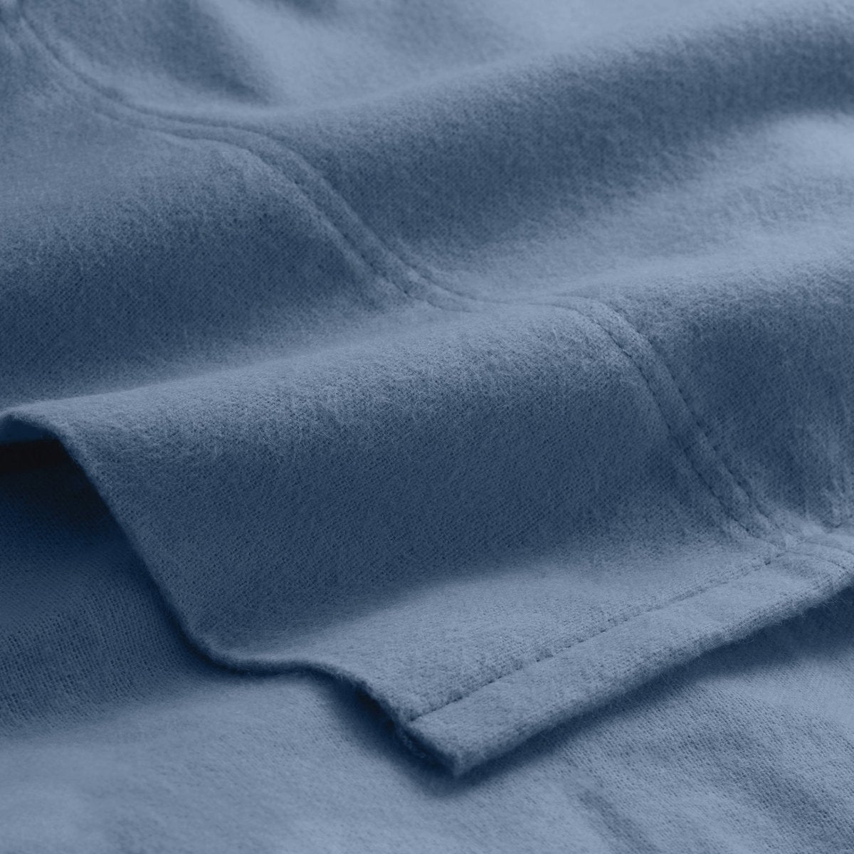 Close-up of flannel fabric with a focus on texture and color.