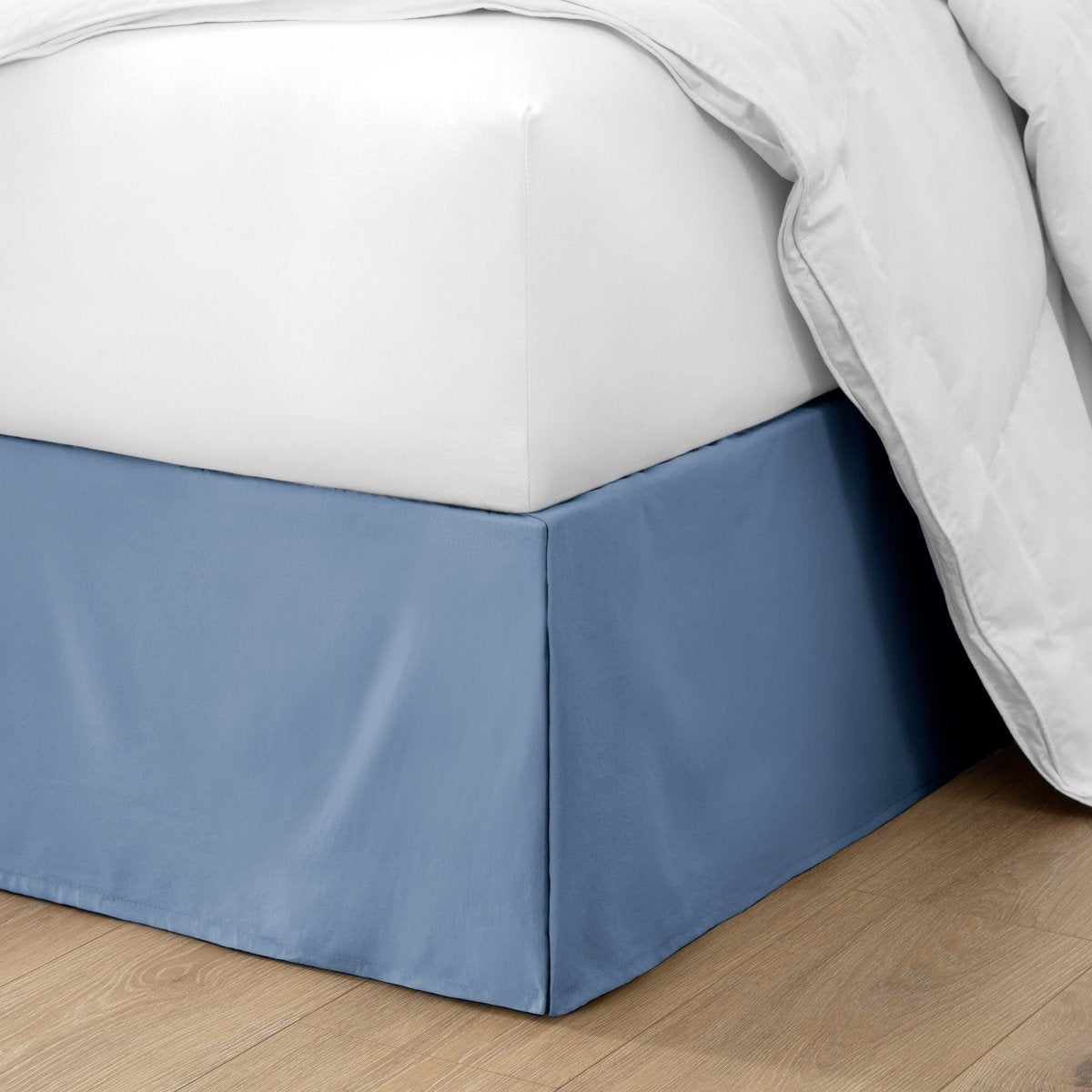 Ultra soft bed skirt on a bed with white bedding.