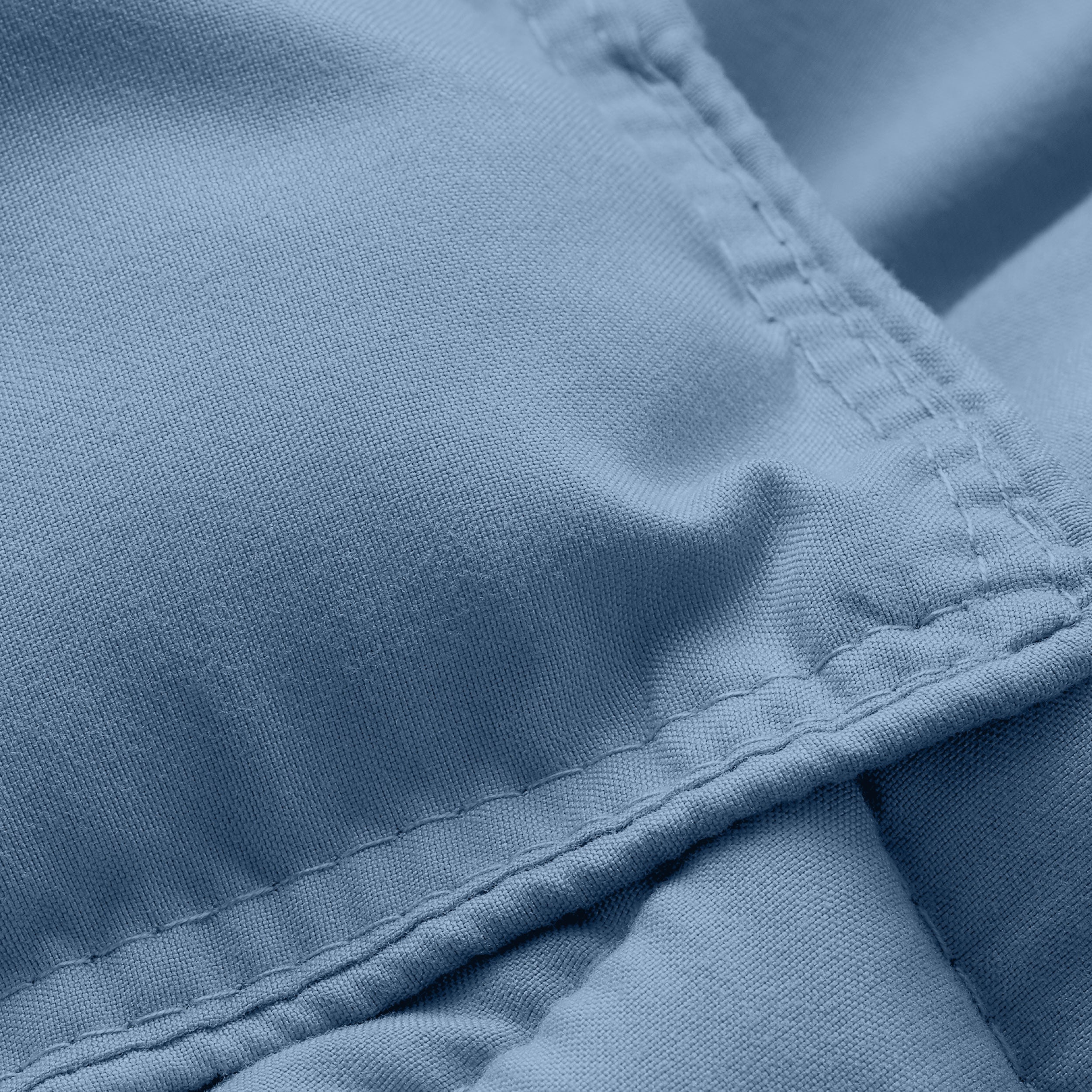 Close-up of comforter fabric with stitching detail