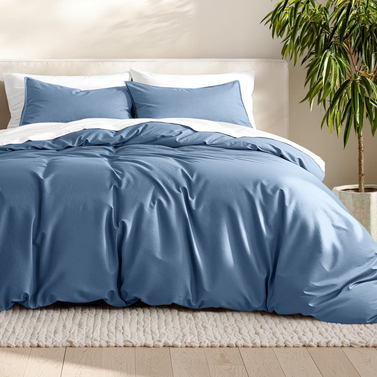 Microfiber bedding set on a bed with a neutral background