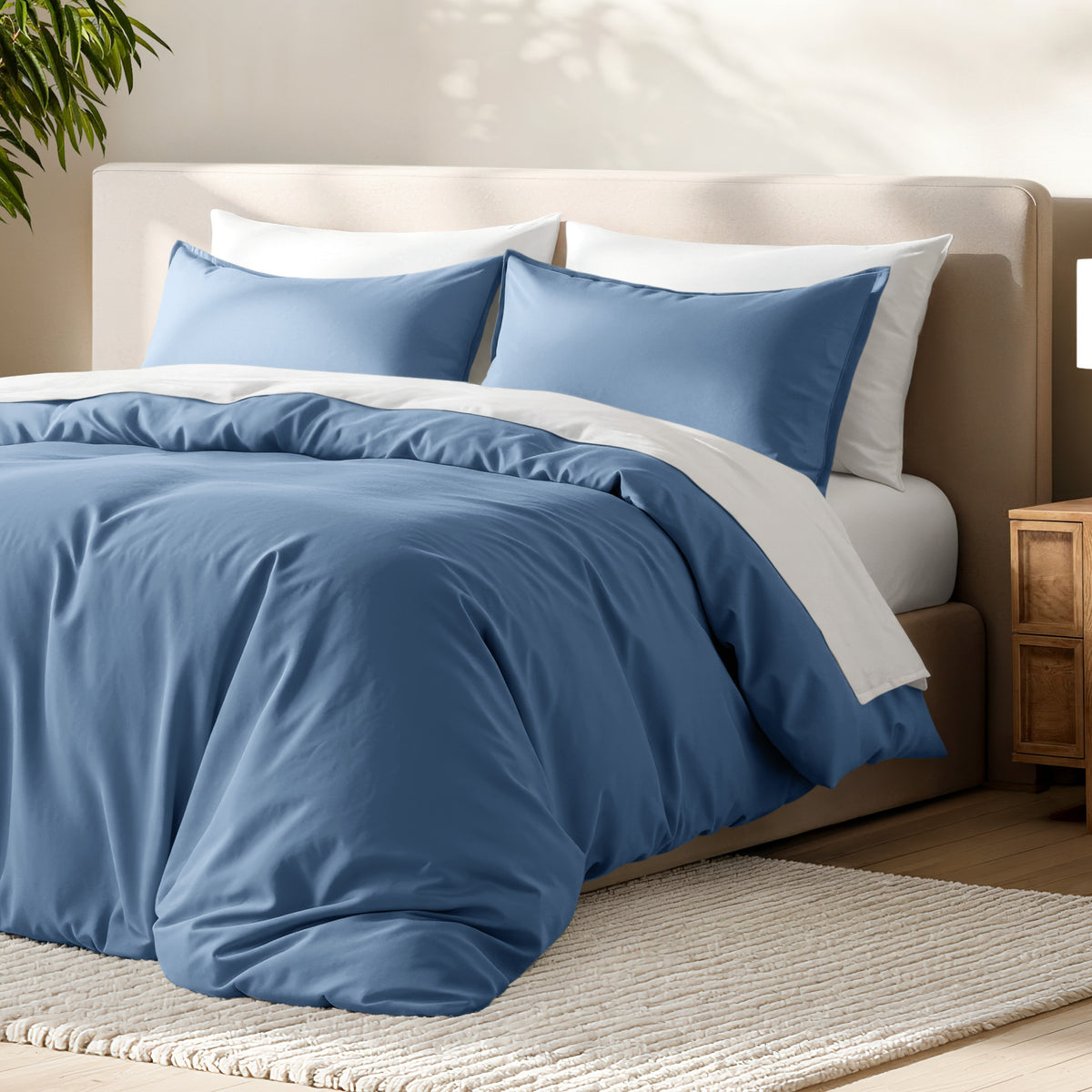 Bed with microfiber duvet cover and sham set in a bedroom setting.