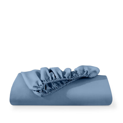 Microfiber fitted sheet folded with a white background