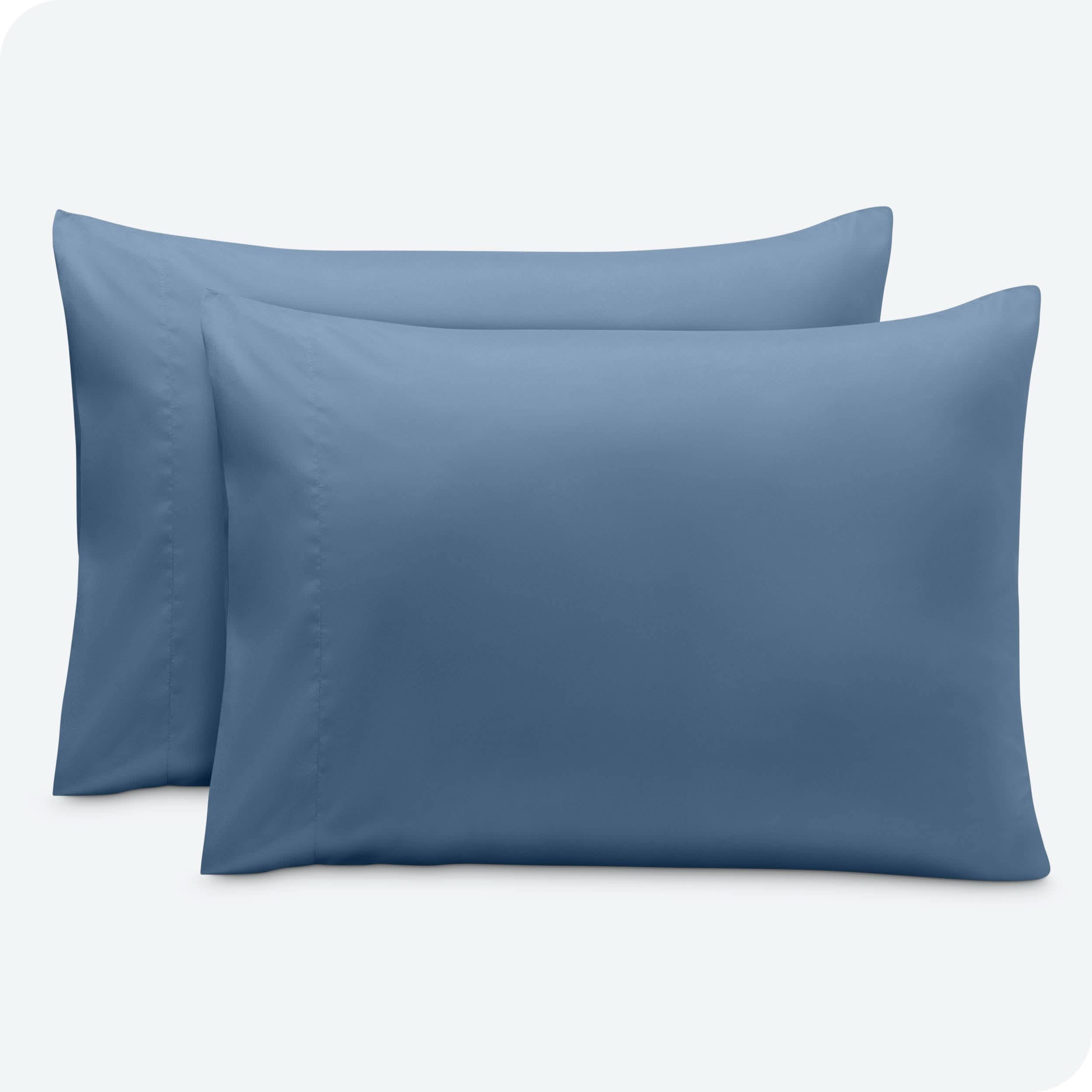 2 pillowcases on pillows