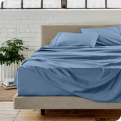 A modern bedroom with microfiber sheets on the mattress