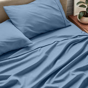 Close up of ultra-soft sheets on a bed