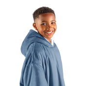 Close up of a sherpa wearable blanket on a child