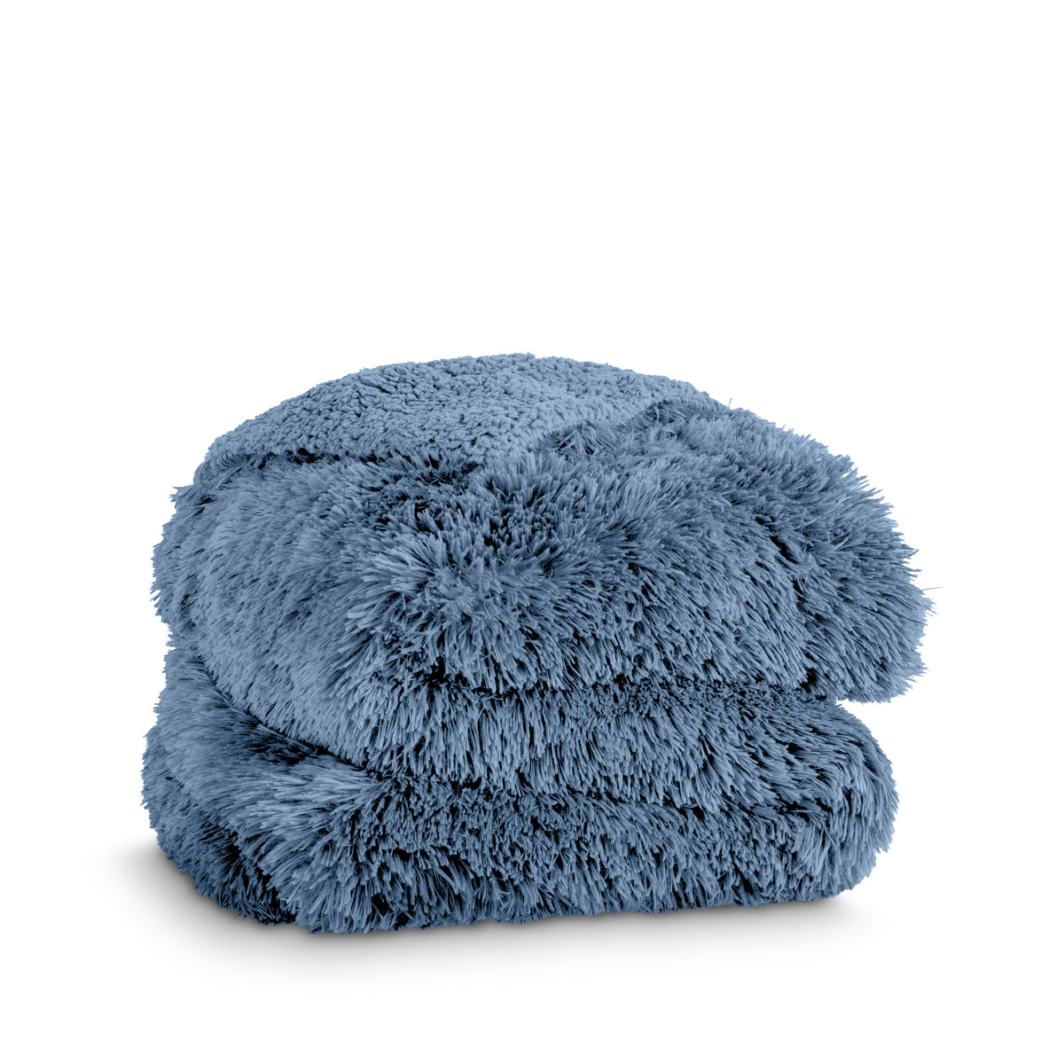 A shaggy faux fur blanket folded