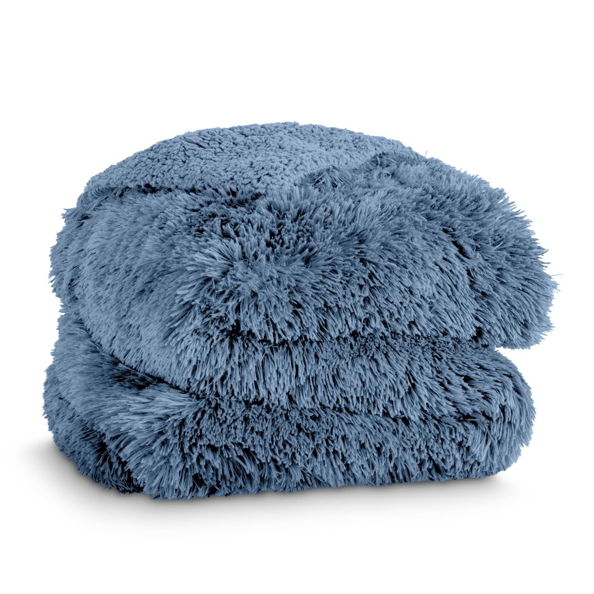 A shaggy faux fur blanket folded neatly