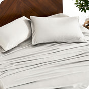 Close up of bamboo sheets and pillowcases on a bed