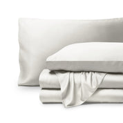 Bamboo pillowcases and sheets set on a white background